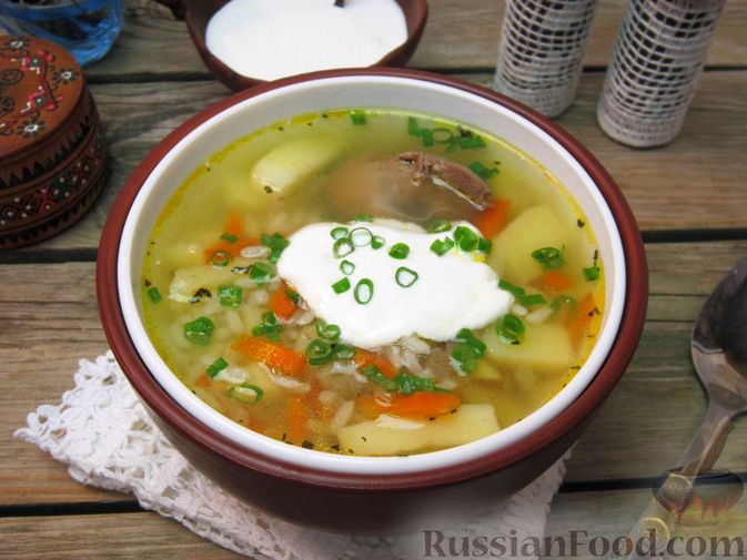 Фото к рецепту: Суп с куриной печенью и рисом