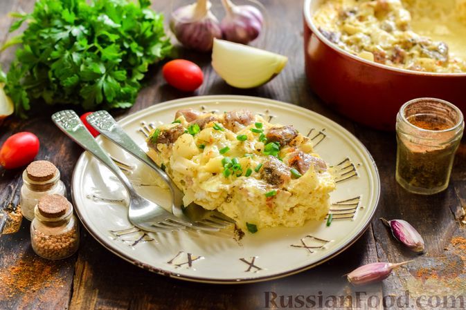 Фото к рецепту: Свинина, запечённая с цветной капустой и сыром Фото к рецепту: Свинина, запечённая с цветной капустой и сыром