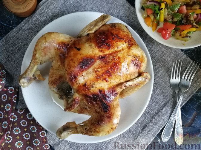 Фото к рецепту: Курица, запечённая в масляно-ванильном соусе с бренди