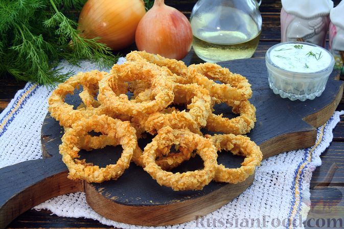 Фото к рецепту: Хрустящие луковые кольца в духовке